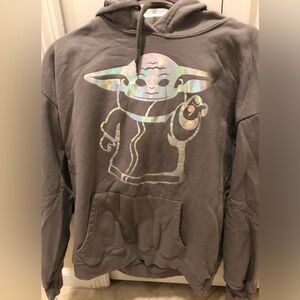 Star Wars The Child hoodie with iridescent Grogu graphic on front & down sleeve